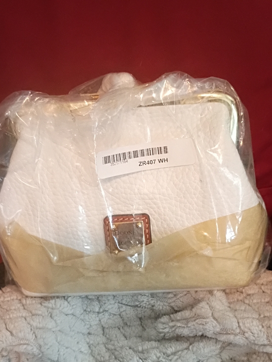 Dooney & Bourke Handbags - Dooney & Bourke White and Tan Leather Frame Clutchff To